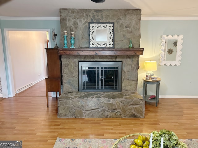 unfurnished living room with a baseboard radiator, a fireplace, light hardwood / wood-style floors, and crown molding