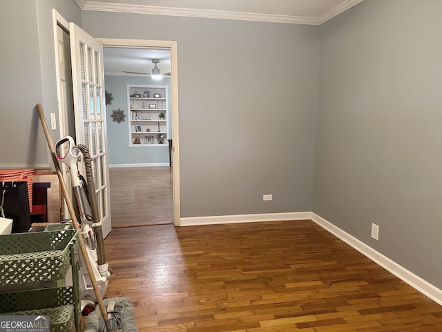 interior space featuring crown molding and hardwood / wood-style floors