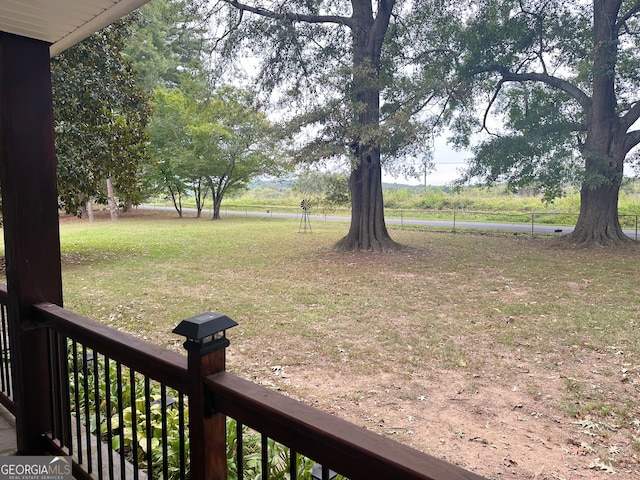 view of yard with a rural view