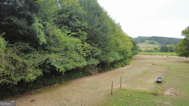 view of home's community featuring a rural view