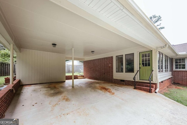 view of patio / terrace featuring a carport