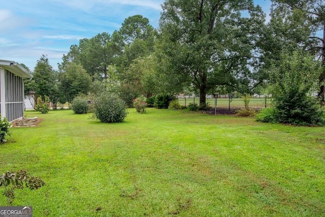 view of yard featuring fence