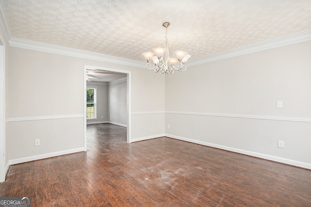 unfurnished room featuring crown molding, a textured ceiling, a notable chandelier, and dark hardwood / wood-style floors