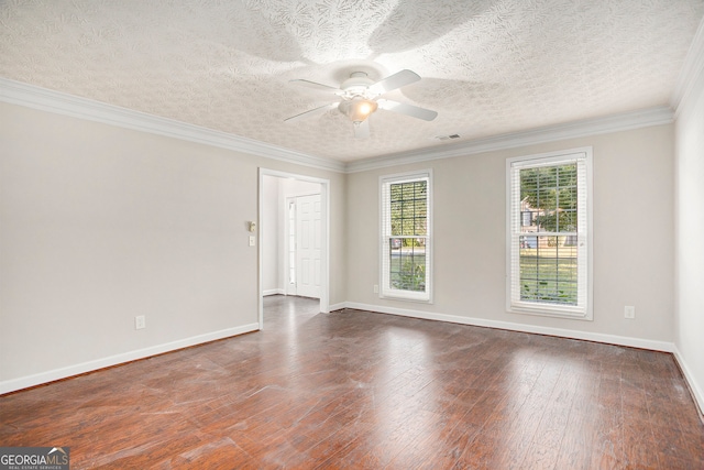 unfurnished room featuring ceiling fan, dark hardwood / wood-style floors, crown molding, and a textured ceiling