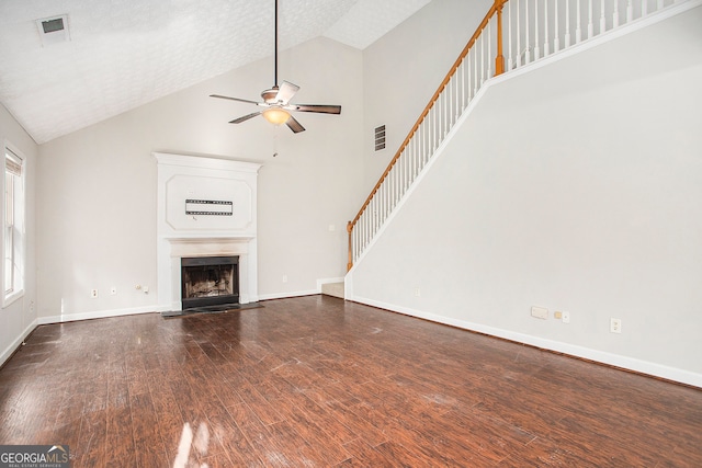 unfurnished living room featuring a textured ceiling, high vaulted ceiling, ceiling fan, and wood-type flooring