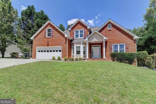 front facade featuring a garage and a front lawn