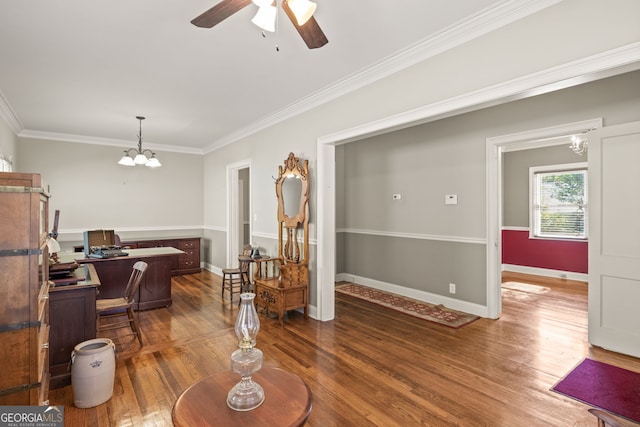 interior space with ceiling fan with notable chandelier, dark hardwood / wood-style floors, and crown molding