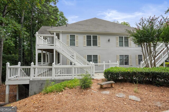 rear view of property with a deck