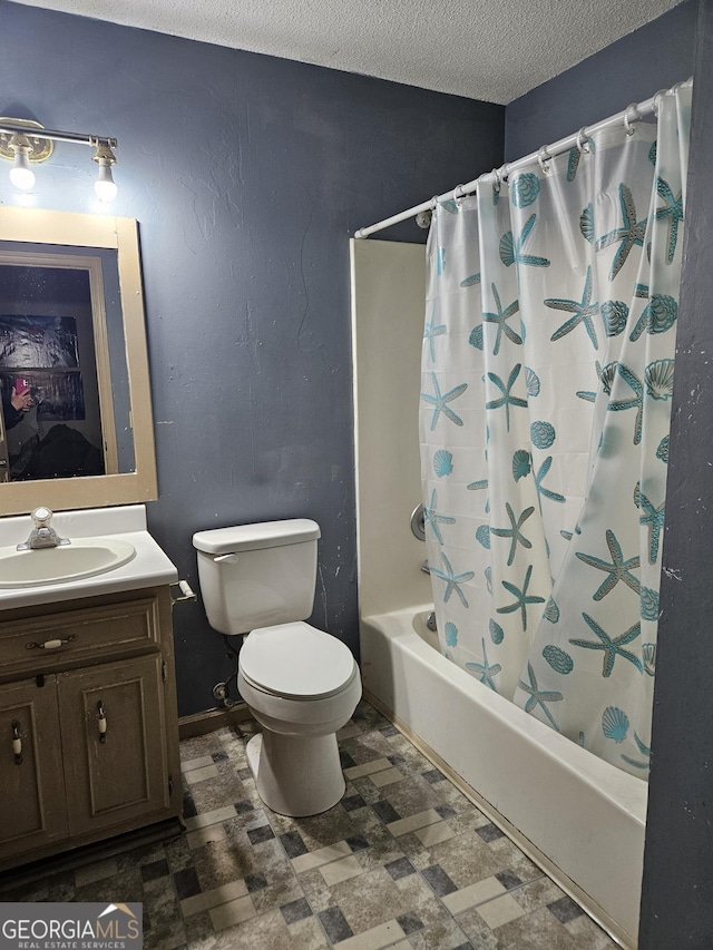 full bathroom with a textured ceiling, toilet, vanity, and shower / bath combo with shower curtain