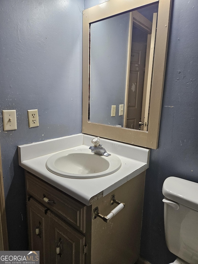 bathroom with sink and toilet