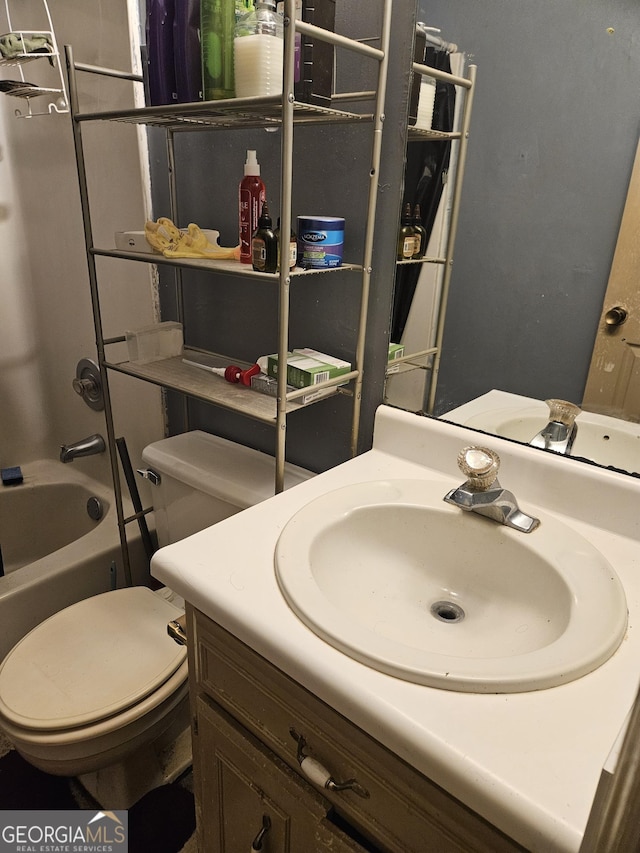 full bathroom featuring toilet, vanity, and shower / bathtub combination