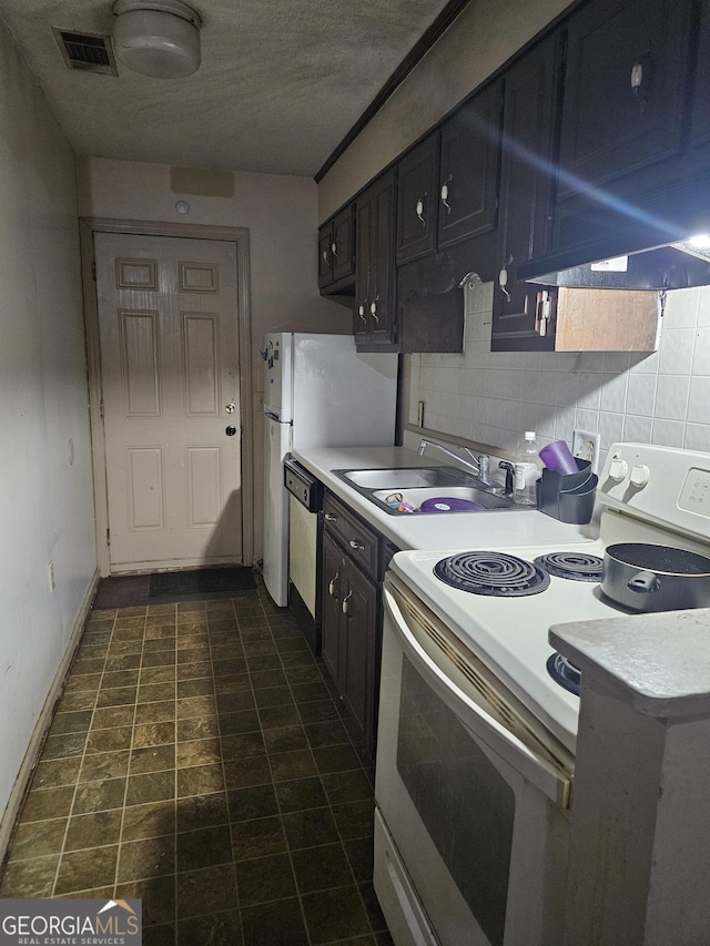 kitchen featuring white electric range, decorative backsplash, sink, a textured ceiling, and dishwashing machine