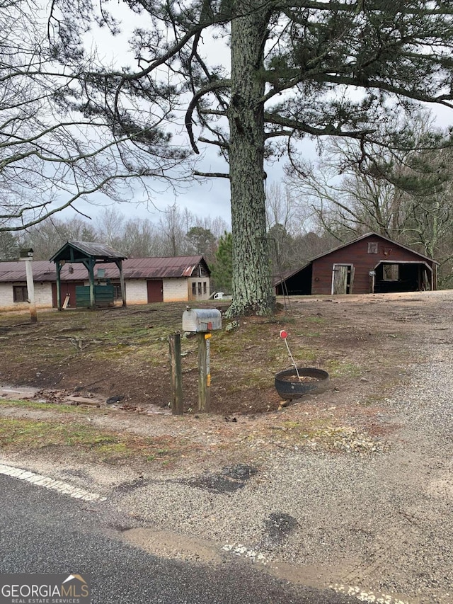 view of front facade with an outbuilding