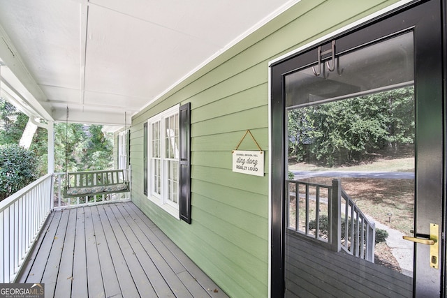 deck featuring a porch