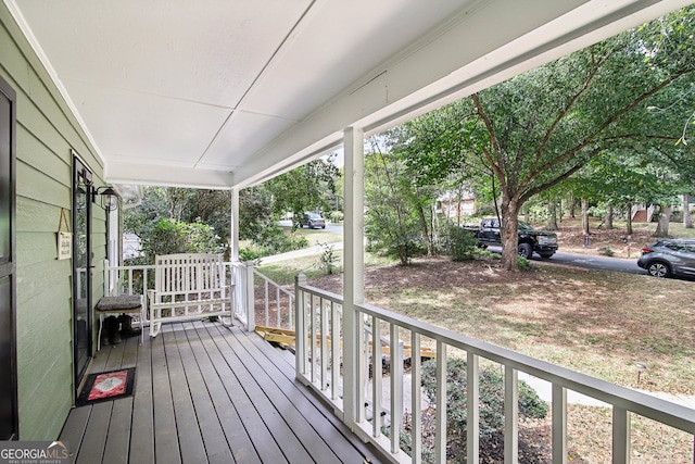 wooden terrace with covered porch