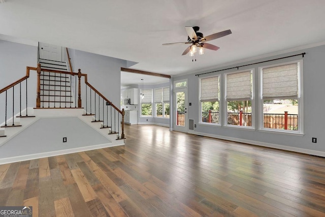 unfurnished living room with hardwood / wood-style floors, ceiling fan, and ornamental molding