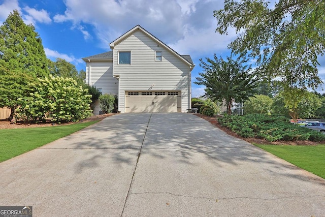 view of home's exterior with a garage