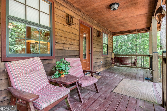 deck featuring covered porch