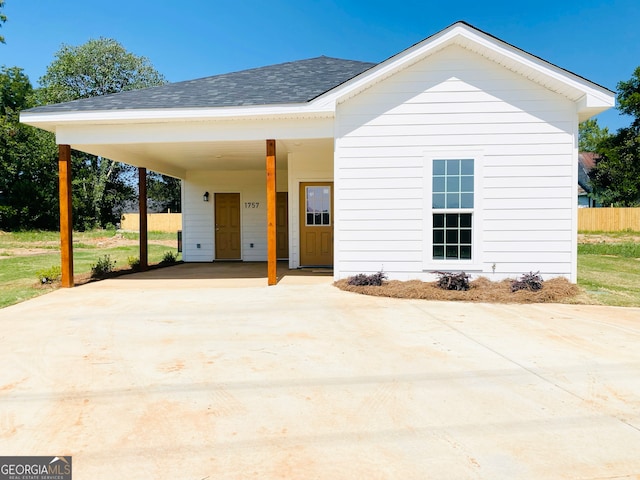 view of front of house with a carport