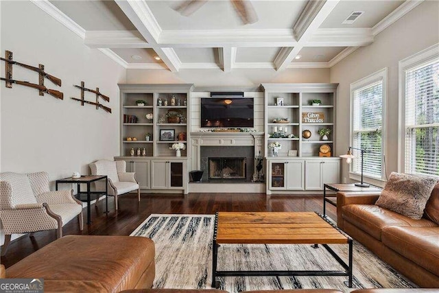 living room with crown molding, dark hardwood / wood-style flooring, beamed ceiling, and coffered ceiling