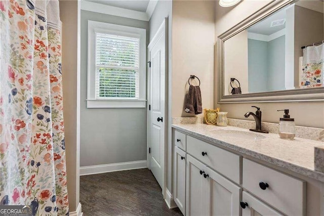 bathroom featuring wood-type flooring and vanity