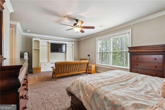 bedroom featuring carpet flooring, ceiling fan, and crown molding