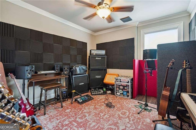 office featuring crown molding and ceiling fan