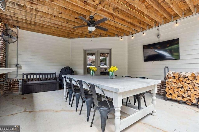 view of patio with ceiling fan and exterior bar