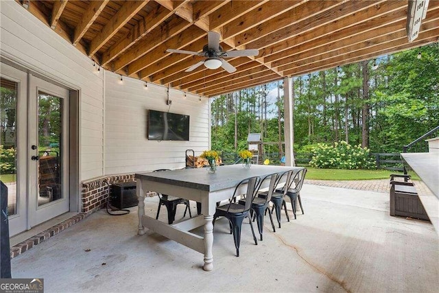 view of patio with ceiling fan and french doors