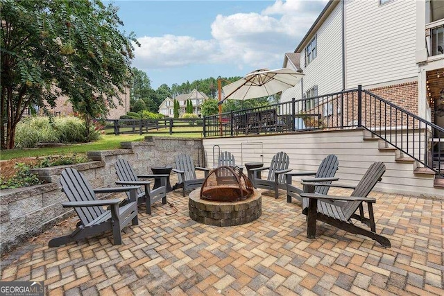 view of patio featuring a fire pit