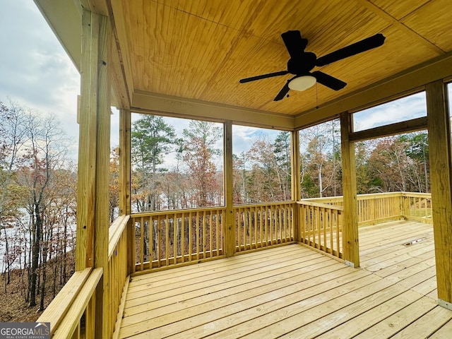 wooden deck with ceiling fan