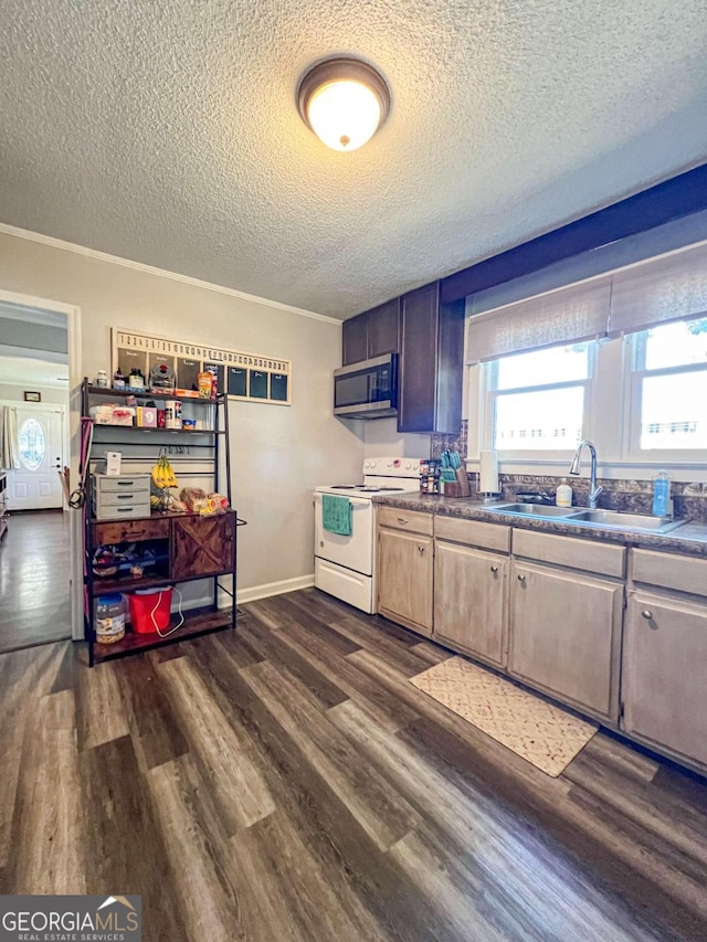 kitchen featuring a textured ceiling, white electric range oven, sink, and dark wood-type flooring