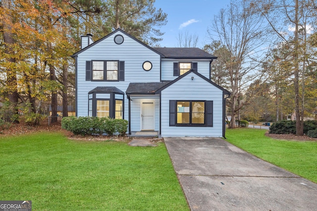 view of front of home with a front yard