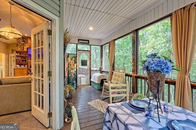 sunroom with wood ceiling