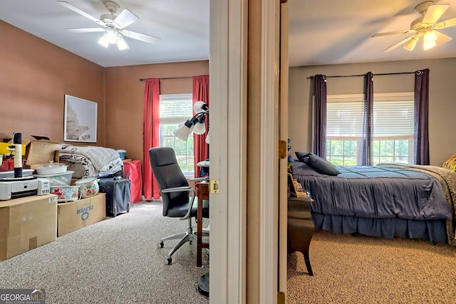 carpeted bedroom featuring ceiling fan