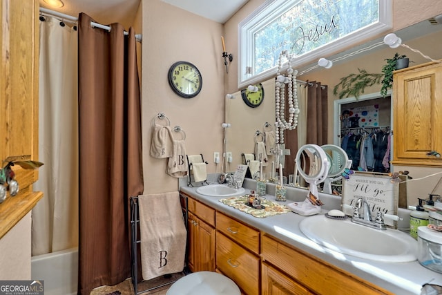 bathroom featuring vanity and shower / bath combo with shower curtain