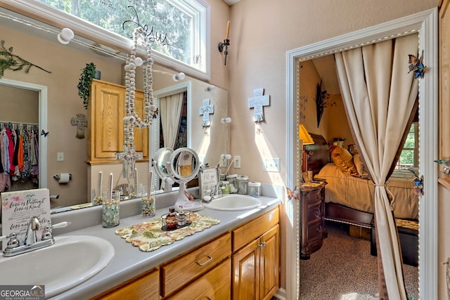 bathroom featuring vanity and plenty of natural light