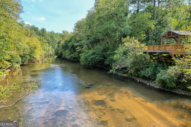 property view of water with a gazebo