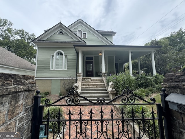 490 Hill St SE, Atlanta, GA 30312 - view of front of house featuring covered porch