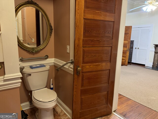 490 Hill St SE, Atlanta, GA 30312 - bathroom featuring ornamental molding, toilet, hardwood / wood-style flooring, and ceiling fan