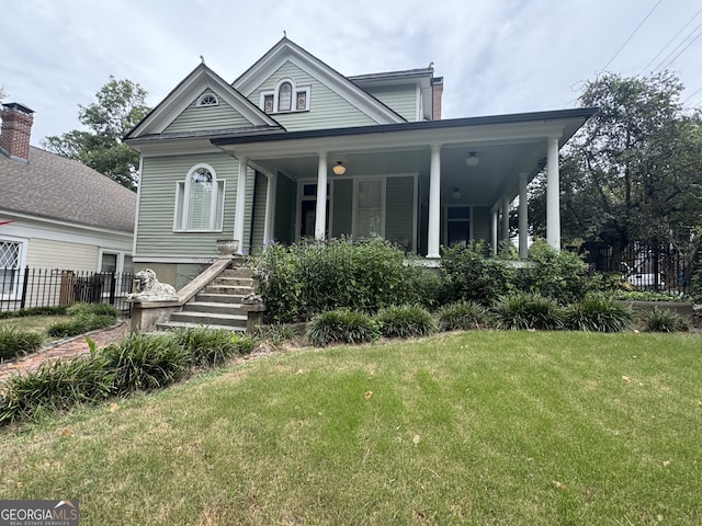 490 Hill St SE, Atlanta, GA 30312 - view of front of home with a porch and a front lawn