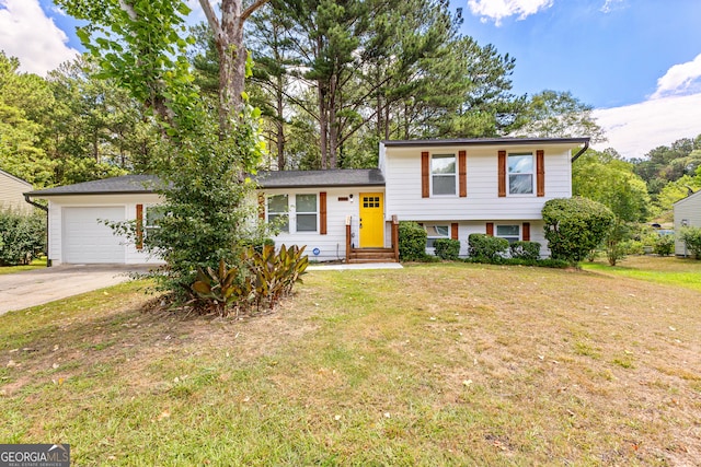 tri-level home featuring a front yard