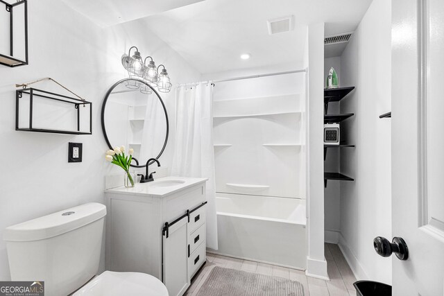 full bathroom with shower / bathtub combination with curtain, wood-type flooring, toilet, and vanity