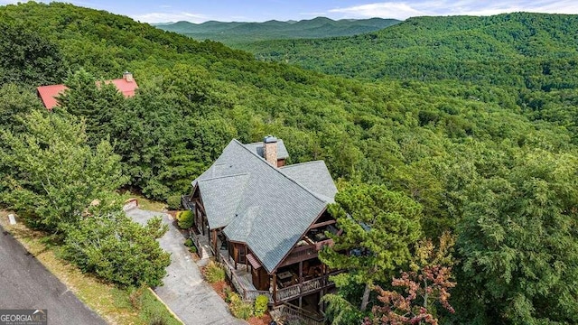 birds eye view of property featuring a mountain view