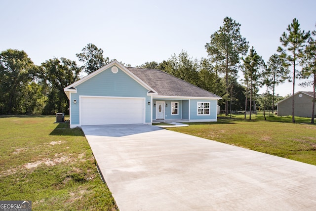 ranch-style home with a garage, a front yard, and central air condition unit