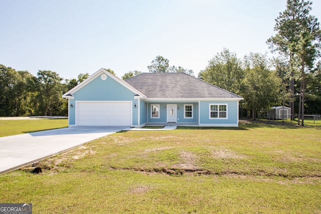 ranch-style house featuring a garage, a front lawn, and a shed