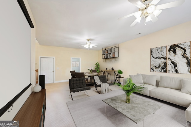 living room with light colored carpet and ceiling fan