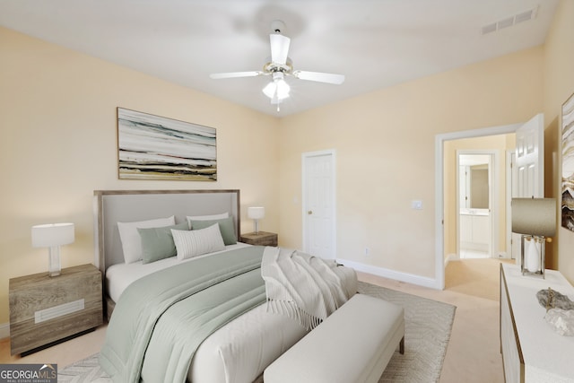 bedroom with light colored carpet and ceiling fan