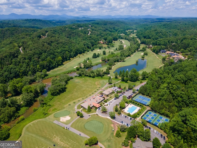 aerial view featuring a water and mountain view