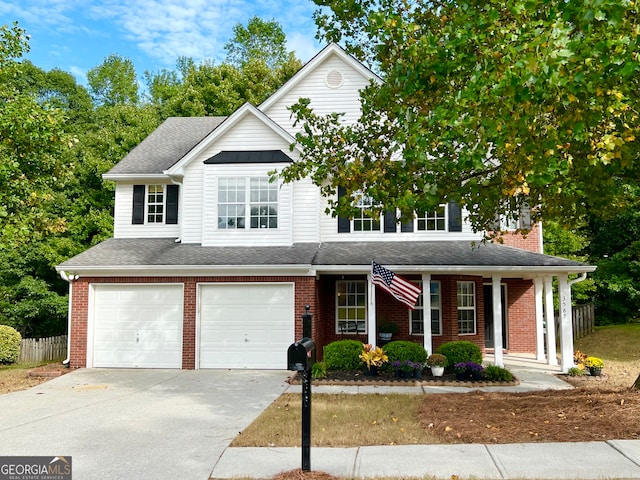 front of property with a garage